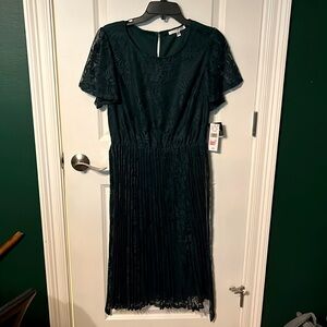 Cute dark green laced cocktail dress with pleats!